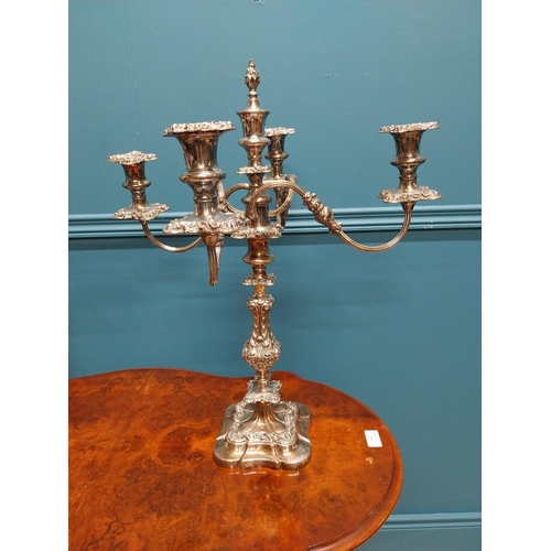 74 - Pair of silverplate four branch candelabras {55 cm H x 49 cm W x 49 cm D}.