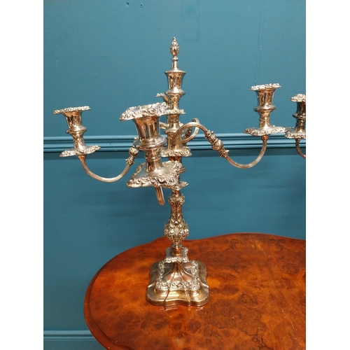 74 - Pair of silverplate four branch candelabras {55 cm H x 49 cm W x 49 cm D}.