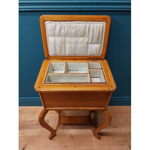 77 - 19th C. oak sewing table with fitted interior. {85 cm H x 83 cm W x 42 cm D}.