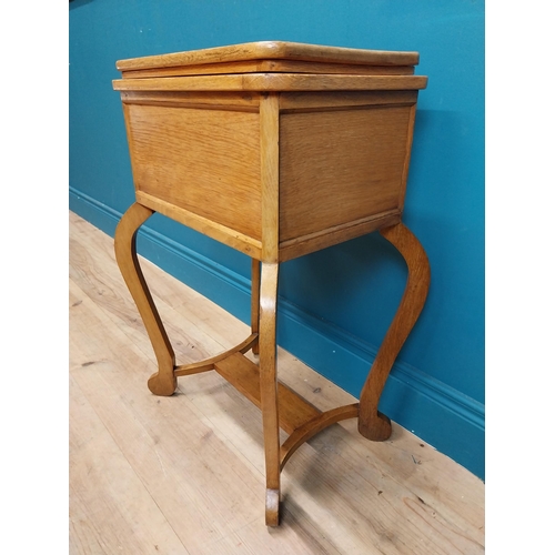 77 - 19th C. oak sewing table with fitted interior. {85 cm H x 83 cm W x 42 cm D}.