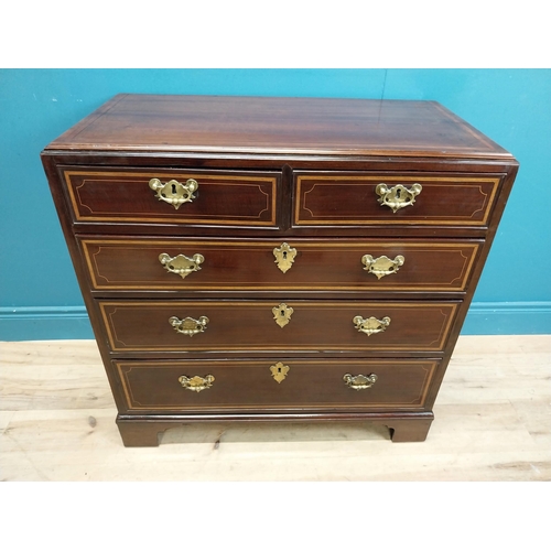 87 - Georgian mahogany chest of drawers with two short drawers over three long drawers and brass handles.... 