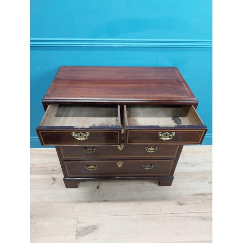 87 - Georgian mahogany chest of drawers with two short drawers over three long drawers and brass handles.... 