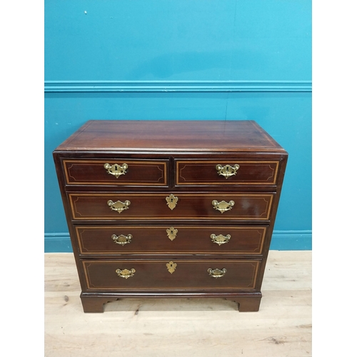 87 - Georgian mahogany chest of drawers with two short drawers over three long drawers and brass handles.... 