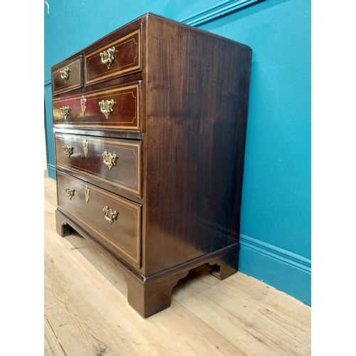 87 - Georgian mahogany chest of drawers with two short drawers over three long drawers and brass handles.... 