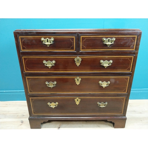 87 - Georgian mahogany chest of drawers with two short drawers over three long drawers and brass handles.... 