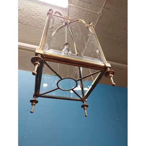 89 - Good quality brass lantern with bevelled glass panels. {70 cm H x 28 cm W x 28 cm D}.