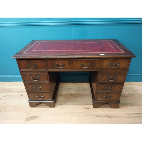 9 - Mahogany desk with tooled leather top in the Georgian style. {77 cm H x 120 cm W x 60 cm D}.