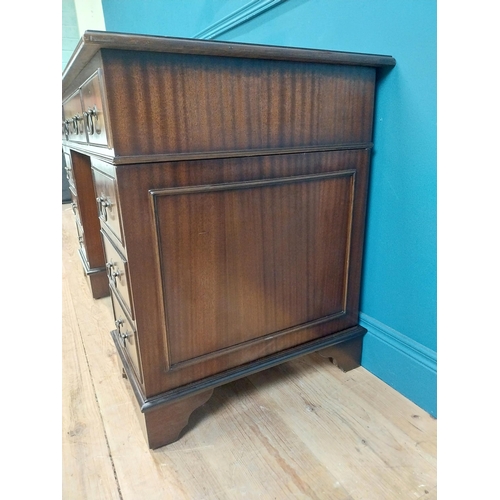 9 - Mahogany desk with tooled leather top in the Georgian style. {77 cm H x 120 cm W x 60 cm D}.