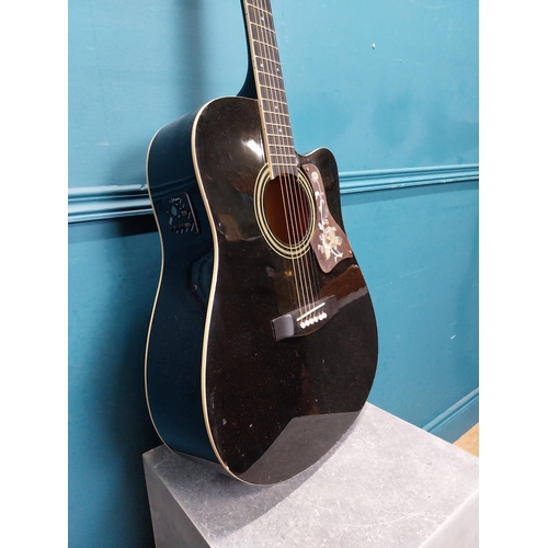 252 - Axman 6 string electric acoustic Guitar {105 cm H x 41 cm W x 40 cm D}.