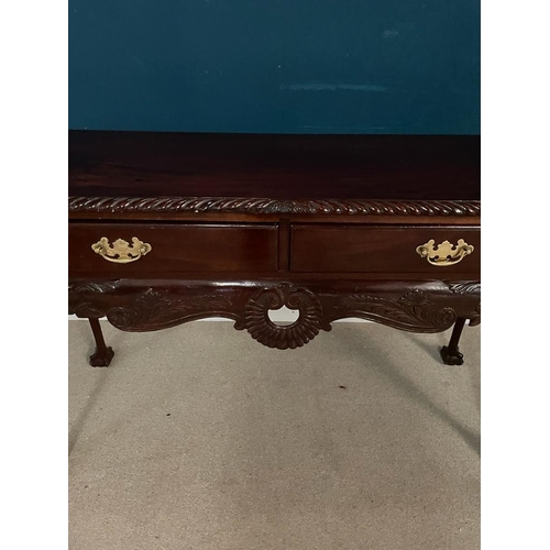 374 - Edwardian Irish mahogany side table with two drawers in the frieze raised on cabriole legs and ball ... 