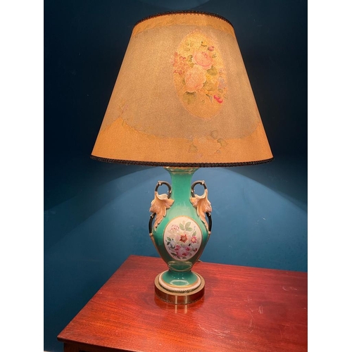 476 - Decorative hand painted ceramic table lamp with cloth shade {}.