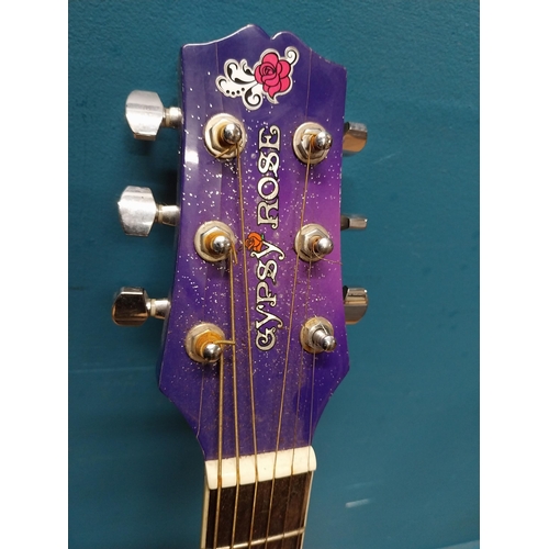 517 - Gypsy Rose 6 string acoustic Guitar {97 cm H x 30 cm W x 10 cm D}.