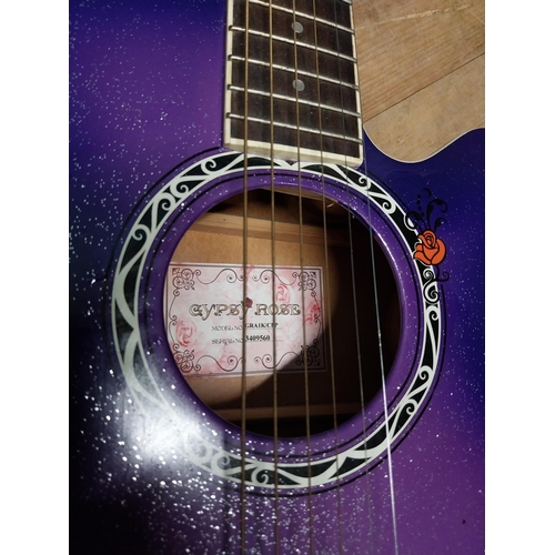 517 - Gypsy Rose 6 string acoustic Guitar {97 cm H x 30 cm W x 10 cm D}.