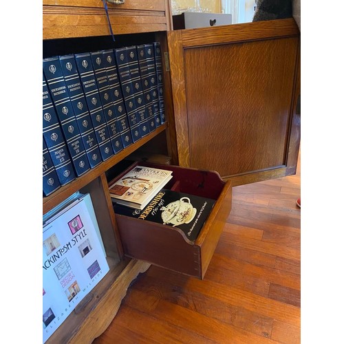 5 - Good quality Victorian oak bookcase, two glazed doors above two drawers and two blind doors {249cm H... 