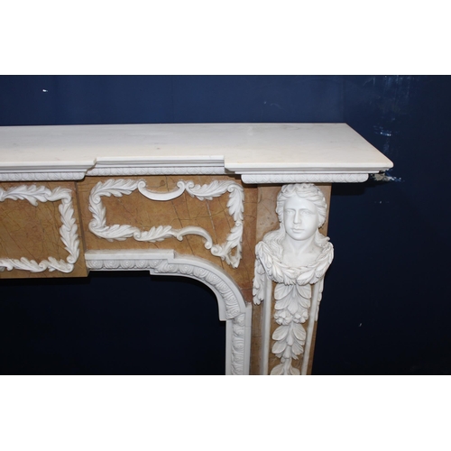 198 - Statuary marble fireplace with jasper inlay decorated with hand carved marble figures {H 115cm x W 1... 