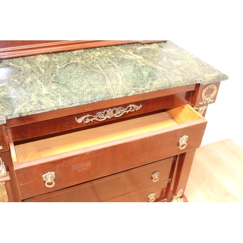 416 - Walnut chest mirrored back surmounted with brass cherubs, swags and eagle above marble top over four... 