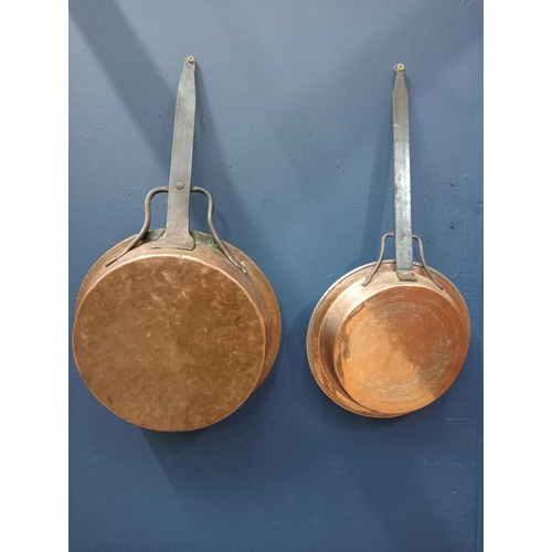 526 - Pair of copper pans {H 8cm x W 54cm x D 3cm} (NOT AVAILABLE TO VIEW IN PERSON)