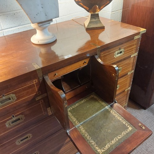 60 - Mahogany brass bound campaign chest {102cm H 118cm W x 57cm D}