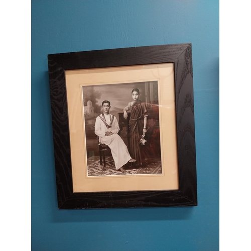 607 - Two framed photographs of Indian family {47 cm H x 42 cm W}.