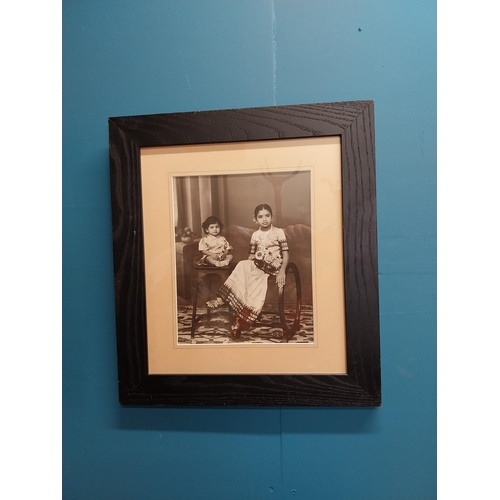 607 - Two framed photographs of Indian family {47 cm H x 42 cm W}.