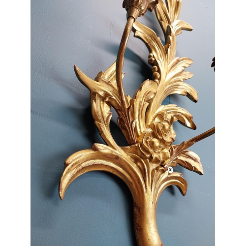 670 - Pair of good quality giltwood wall lights decorated with foliage and flowers. {57 cm H x 25 cm W x 1... 