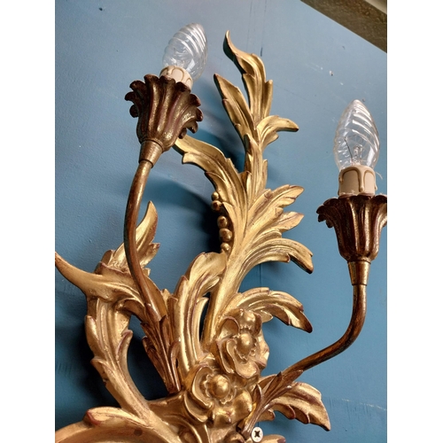 670 - Pair of good quality giltwood wall lights decorated with foliage and flowers. {57 cm H x 25 cm W x 1... 