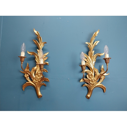 670 - Pair of good quality giltwood wall lights decorated with foliage and flowers. {57 cm H x 25 cm W x 1... 