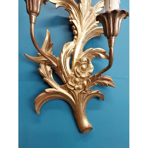 670 - Pair of good quality giltwood wall lights decorated with foliage and flowers. {57 cm H x 25 cm W x 1... 