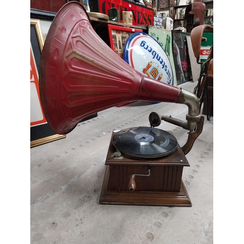 702 - Early 20th C. oak cased gramophone with painted metal horn {67 cm H x 63 cm  W x 53 cm D}.