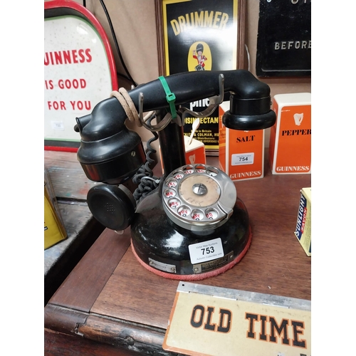 625 - 1930's Bakelite and metal telephone. {24 cm H x 23 cm W x 13 cm D}.