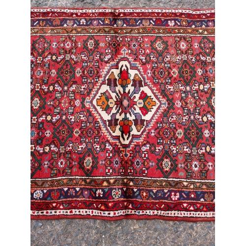 703 - Good quality decorative carpet runner {294cm L x 105cm W} (not available to view in person).