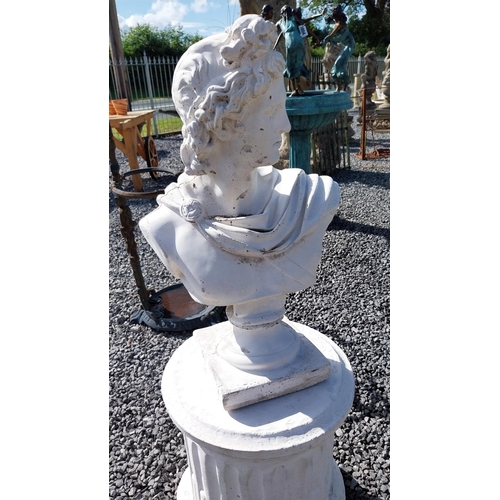 727 - Moulded stone bust of Caesar raised on reeded column {105 cm H x 40 cm W x 37 cm D}.