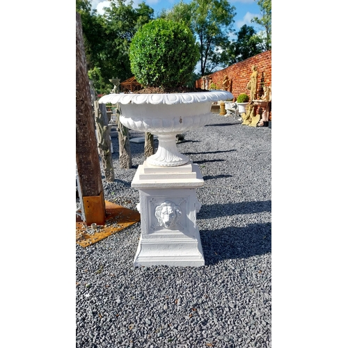 733 - Rare pair of 19th C. cast urns raised on pedestals decorated with lions masks including box ball pla... 