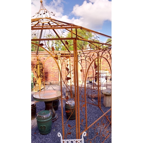 735 - Good quality wrought iron garden gazebo decorated with Ivy leaf {320 cm H x 360 cm Diam}.