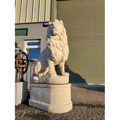 740 - Pair of good quality moulded stone seated lions on pedestals {182cm H x 110cm W x 58cm D}