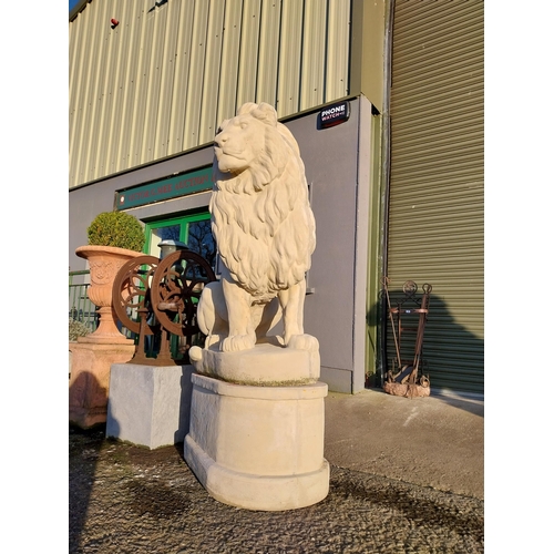 740 - Pair of good quality moulded stone seated lions on pedestals {182cm H x 110cm W x 58cm D}