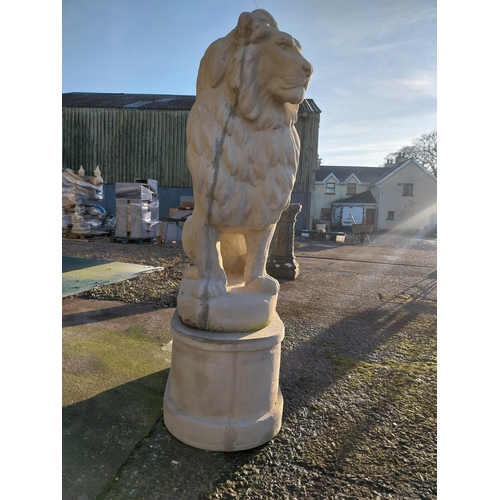 740 - Pair of good quality moulded stone seated lions on pedestals {182cm H x 110cm W x 58cm D}