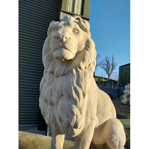 740 - Pair of good quality moulded stone seated lions on pedestals {182cm H x 110cm W x 58cm D}