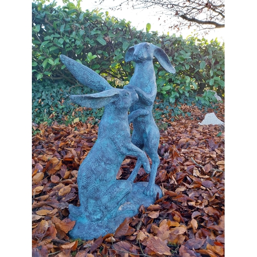 745 - Pair of exceptional quality verdigris bronze  hares at play {78cm H x 75cm W x 37cm D}