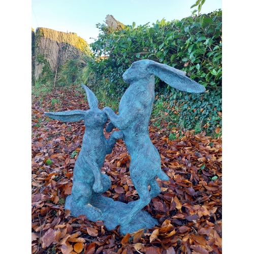 745 - Pair of exceptional quality verdigris bronze  hares at play {78cm H x 75cm W x 37cm D}