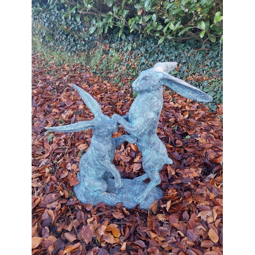 745 - Pair of exceptional quality verdigris bronze  hares at play {78cm H x 75cm W x 37cm D}