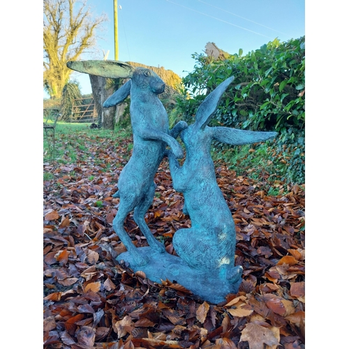 745 - Pair of exceptional quality verdigris bronze  hares at play {78cm H x 75cm W x 37cm D}