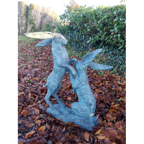 745 - Pair of exceptional quality verdigris bronze  hares at play {78cm H x 75cm W x 37cm D}