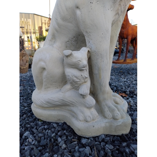 750 - Molded stone model of an Alsation dog with pups {97cm H x 50cm W x 36cm D}