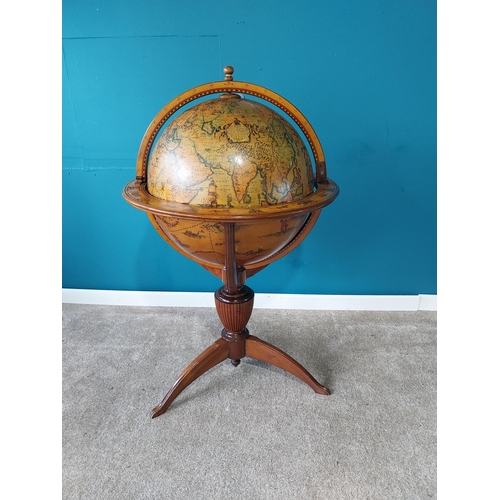 760 - Globe on stand in the form of a drinks' cabinet { 120cm H X 80cm Dia }.{ cm H  cm W cm D}. (NOT AVAI... 