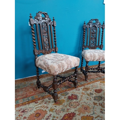 770 - Pair of carved oak hall chairs with upholstered seats { 107cm H X 49cm W X 45cm D }. { cm H  cm W cm... 