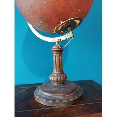 781 - Rare early 20th C. light up glass world globe on brass and walnut stand {63 cm H x 34 cm W x 30 cm D... 