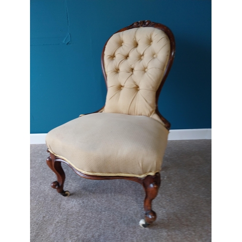 785 - Victorian mahogany and upholstered nursing chair raised on cabriole legs with brass and ceramic cast... 