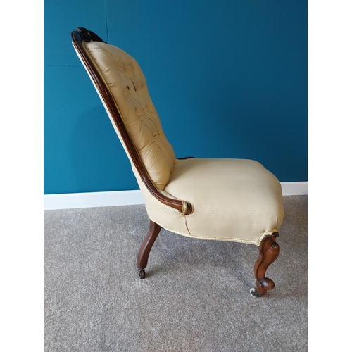 785 - Victorian mahogany and upholstered nursing chair raised on cabriole legs with brass and ceramic cast... 