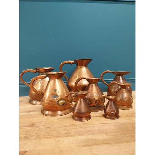 796 - Set of eight 19th C. copper measures. {40 cm H x 40 cm W x 32 cm D} to {14 cm H x 12 cm  W x 10 cm D... 